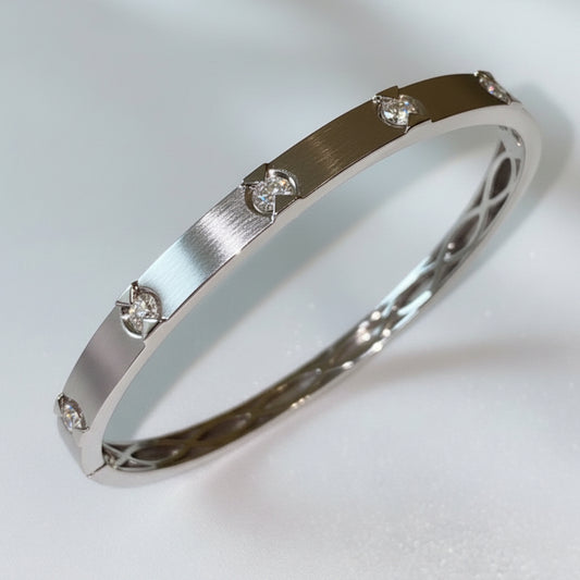 Natural Diamond (SI1 clarity/ G colour) bangle in sterling silver.