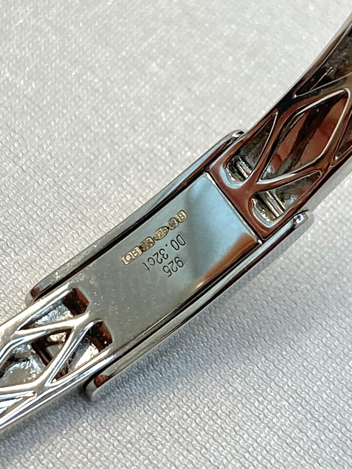 Natural Diamond (SI1 clarity/ G colour) bangle in sterling silver.