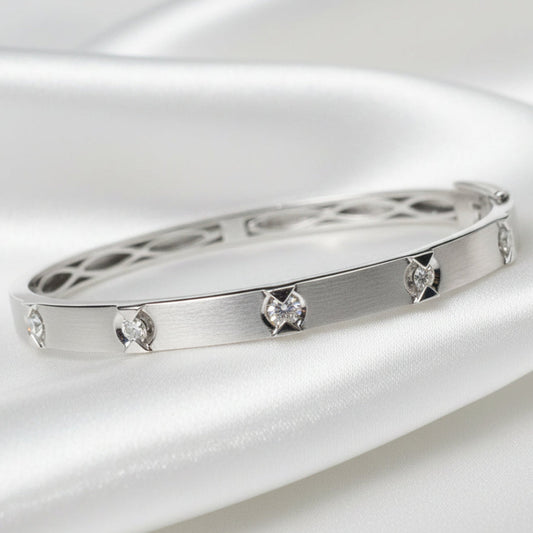 Natural Diamond (SI1 clarity/ G colour) bangle in sterling silver.