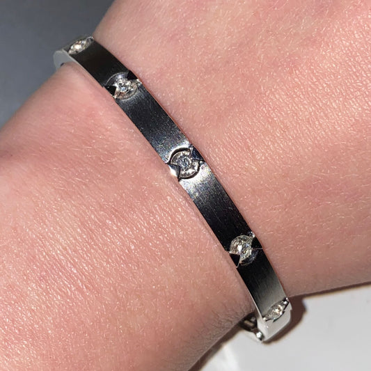 Natural Diamond (SI1 clarity/ G colour) bangle in sterling silver.
