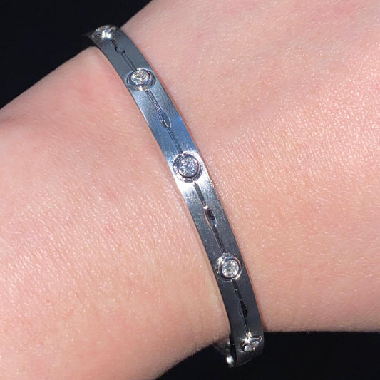 Natural diamond in bezel set and leaf shape bangle in sterling silver