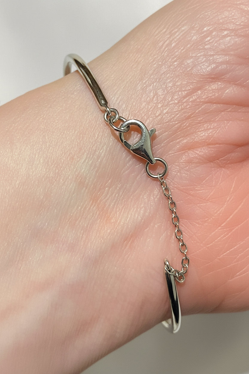sterling silver natural diamond and blue sapphire bangle