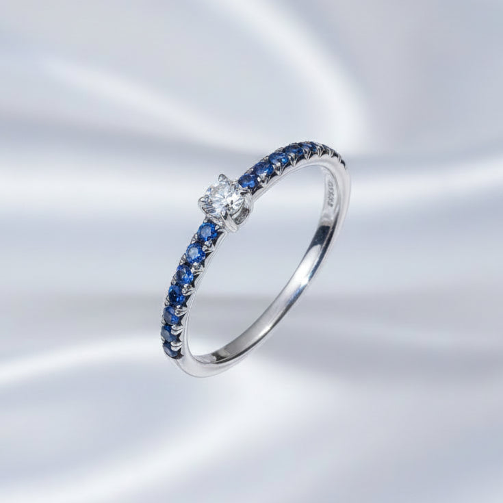 0.08CT solitaire natural colour ring in sterling silver